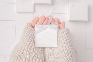 Embossed Dustyrosa label with organza ribbon