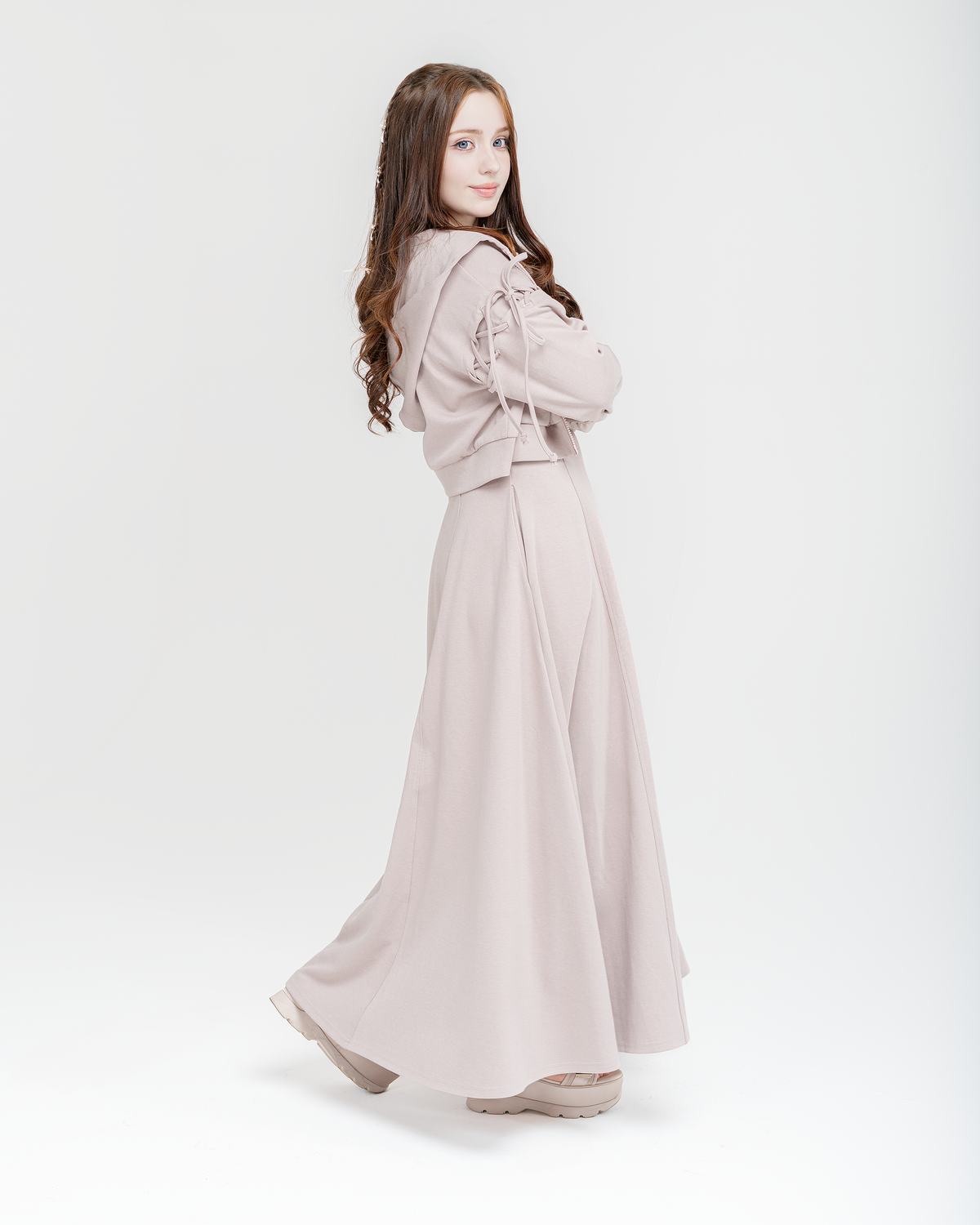Luna set in dusty rose: cropped hoodie with long A-line dress, walking pose