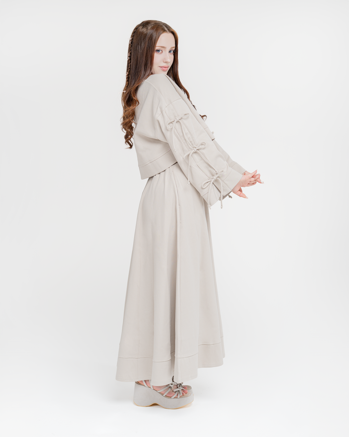 Reverie set in antique beige, back view with flowing maxi skirt