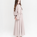 Reverie set in dusty rose, side view of sweater and maxi skirt