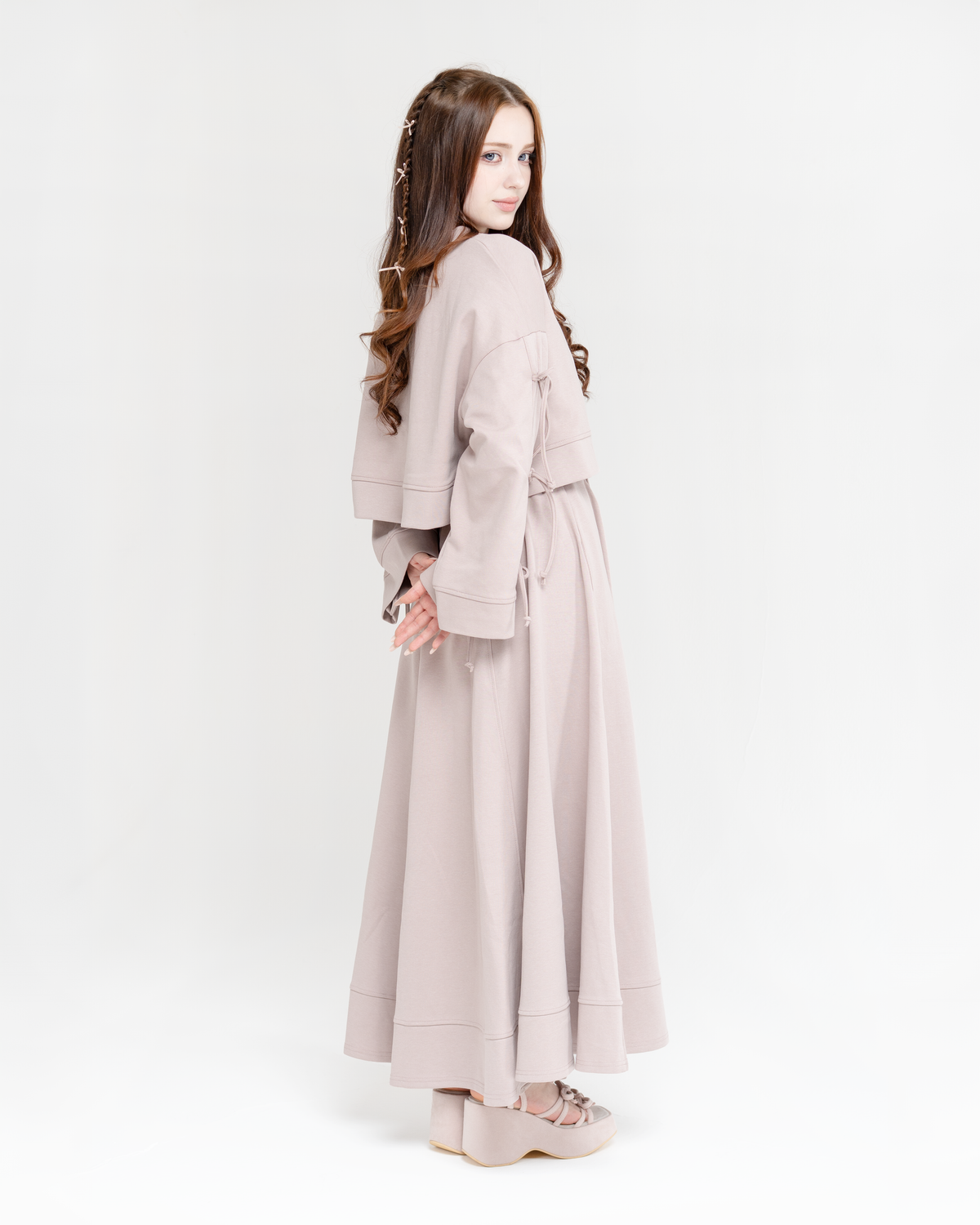 Reverie set in dusty rose, side view of sweater and maxi skirt